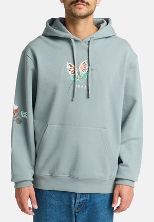 Light blue hoodie with a front pocket, drawstring hood, and butterfly embroidery. Features floral accents on the sleeves. Soft texture.