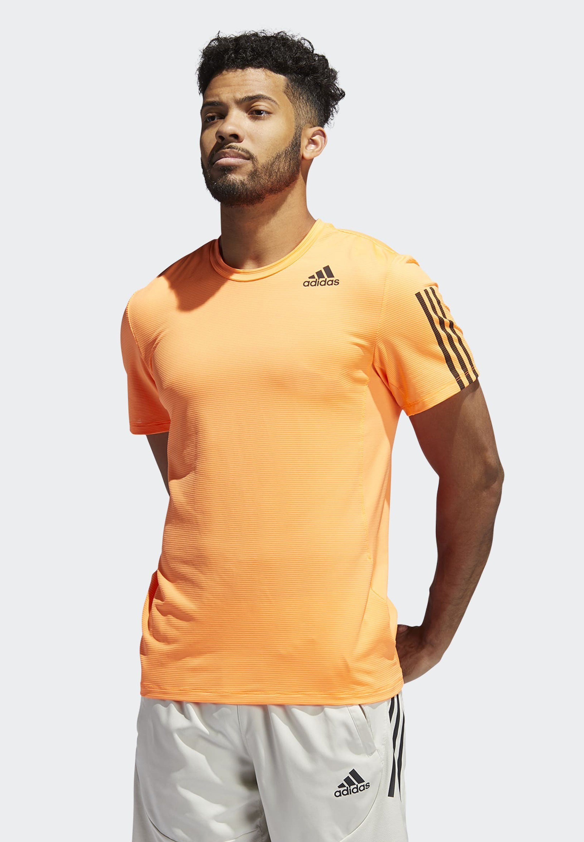 adidas Performance PRIMEBLUE AEROREADY 3-STREIFEN SLIM T-SHIRT - Camiseta  estampada - orange/naranja - Zalando.es