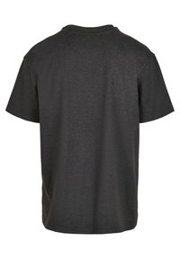 Short-sleeve t-shirt made of dark gray fabric, featuring a crew neckline and a relaxed fit, with a smooth texture and no visible designs.