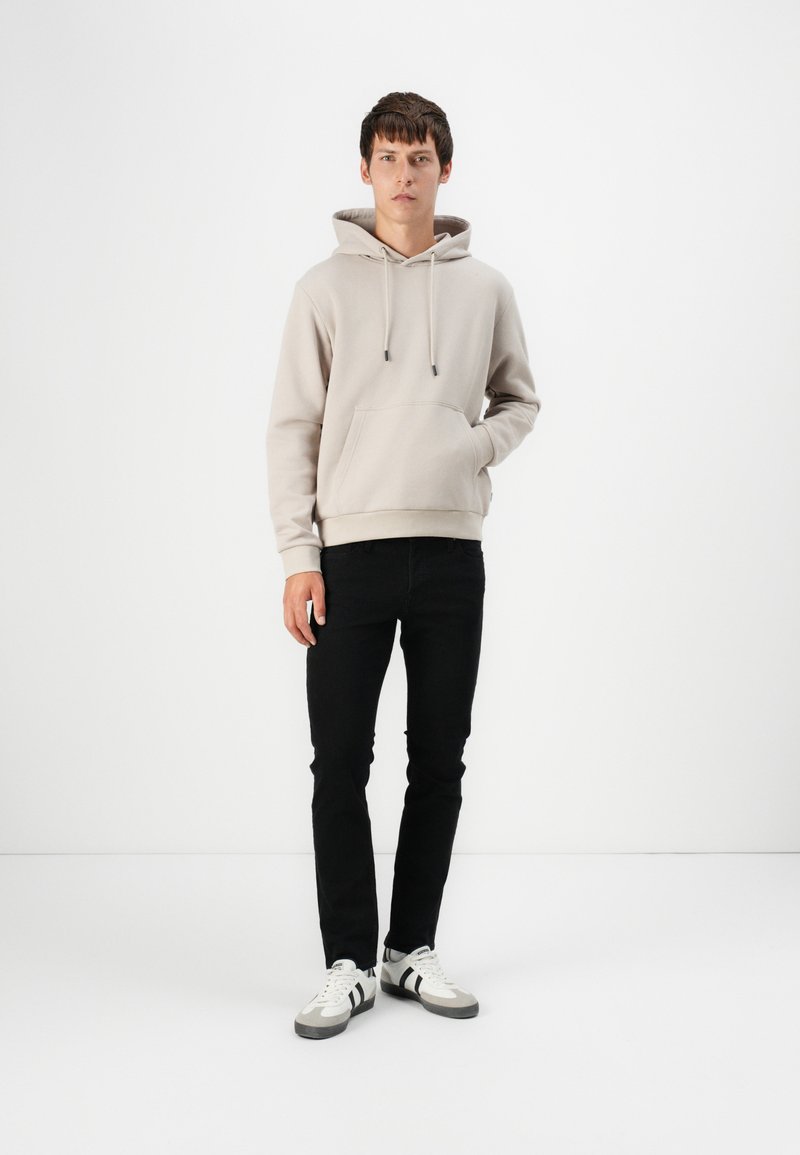 Pull TOPMAN de la taille L, de couleur beige