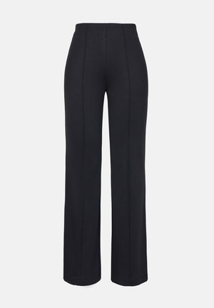 Pantaloni neri in maglia con vita alta, taglio ampio e dettagli di cucitura centrale. Texture liscia e design minimalista, senza ulteriori accenti.