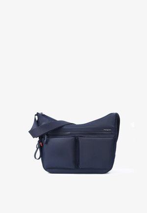 Marineblå crossbody taske med justerbar rem, to frontlommer med lynlås, et top lynlåskompartement og lille metal mærkelogo foran.