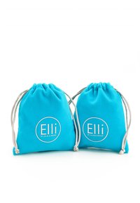 Dve turkizne platnene torbice z vrvico z belim logotipom "Elli by Julie & Grace", ki se ponašata z gladko teksturo in mehak zaključek.