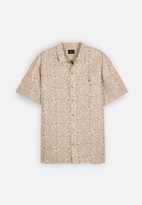 Chemise beige à manches courtes avec un motif floral géométrique blanc et une poche poitrine.