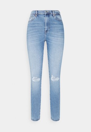 Jean skinny taille haute bleu clair avec des détails déchirés aux deux genoux et un design classique à cinq poches.