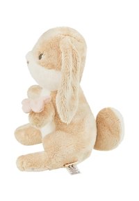Plush rabbit toy in light brown and cream. Features soft fur, long ears, and holds a pink flower. Rounded tail and stitched facial details.