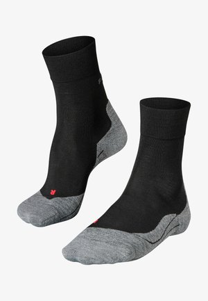 Calcetines tobilleros en negro y gris con una parte superior negra y talón y puntera grises. Incluye un pequeño logo rojo en el talón. Material de mezcla de algodón.