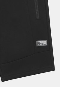 Jack & Jones Junior JJIAIR - Teplákové kalhoty - black