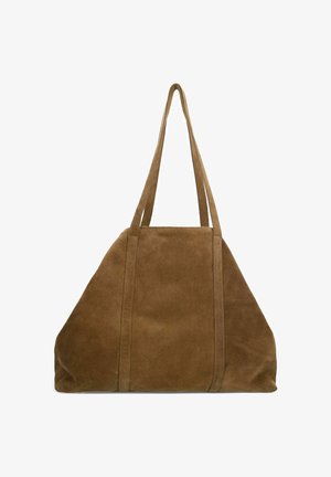 Tan suede tote bag with two long straps, triangular shape, and reinforced seams. Smooth texture with a simple, minimalist design.