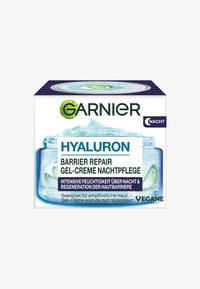 Hyaluron barrier repair gel-cream night care in a transparent jar with a blue lid, featuring green accents and text in varying fonts.