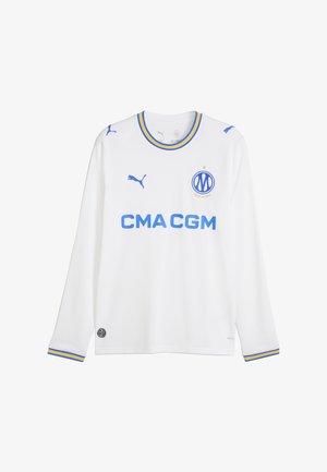 Biała, długorękawowa koszulka piłkarska z niebieskimi logotypami Puma, herbem Marsylii, sponsorem CMA CGM oraz kołnierzykiem i mankietami w niebiesko-żółte paski.