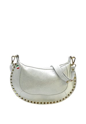 White semi-circular handbag with gold studs along edges, detachable strap, zipper closure, and small Italian flag tag on side.