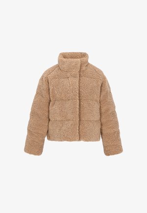 Bēšs saīsināts žakets, izgatavots no mīksta, teksturēta materiāla, ar augstu apkakli un kvadrātveida šuvēm, piešķirot papildus detaļas.