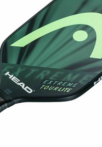 Head Extreme Tourlite Pickleball-Schläger in Dunkelgrün mit Neonakzenten und einem stilisierten Logo nahe dem Griff.