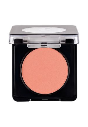 Compact black plastic case with transparent lid containing a round pan of peach-colored pressed powder blush.