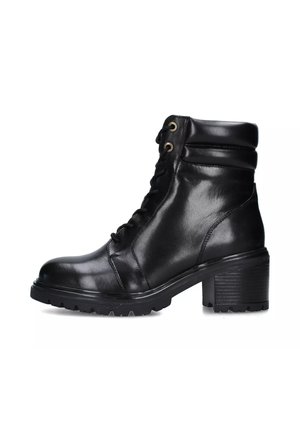 Stivaletti con plateau - black