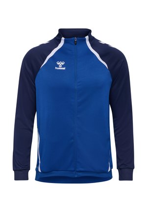 Blauwe en marineblauwe trainingsjack met een hoge kraag, lange mouwen, ritssluiting en witte accenten. Voorzien van een logo op de borst. Glad textuur.