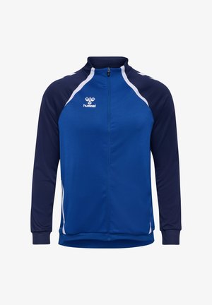Blauwe en marineblauwe trainingsjack met een hoge kraag, lange mouwen, ritssluiting en witte accenten. Voorzien van een logo op de borst. Glad textuur.