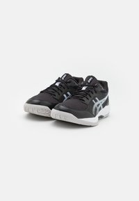 Black athletic shoes with a textured mesh upper, white stripe accents, and a rubber sole featuring round grip patterns.