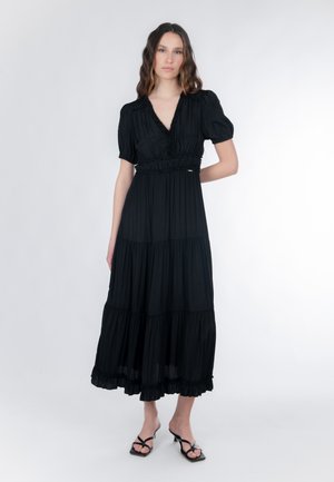 Schwarzes Maxikleid mit tiefem V-Ausschnitt, kurzen Puffärmeln und gestuftem Saum. Hergestellt aus einem weichen, fließenden Stoff mit gerafften Taillendetails.