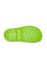 Suela de zapato de goma verde con un diseño texturizado y un patrón en relieve para mayor agarre, que presenta acentos circulares y rectangulares elevados para mejorar la tracción.