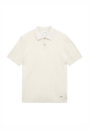 Cremefarvet polo shirt med korte ærmer, diskret tekstureret diamantmønster, knaplukning og lille mærke nær kanten.