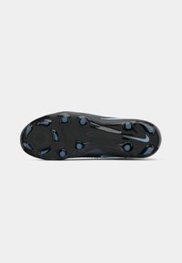 Black soccer cleat sole with six round studs and blue accents, including a blue Nike swoosh near the toe and heel areas.
