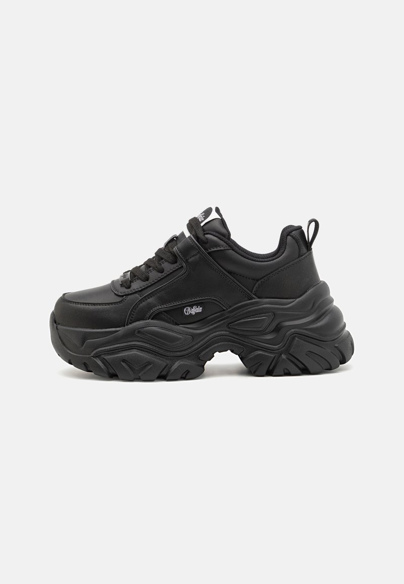 Black athletic sneakers with a chunky rubber sole, padded collar, and lace-up design. Made of synthetic leather with subtle logo accents.