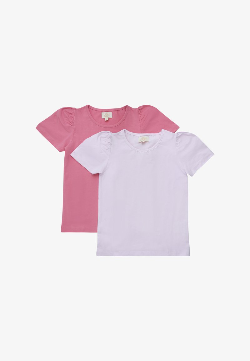 Deux T-shirts à manches courtes, l'un rose et l'autre blanc, avec des manches bouffantes et une texture douce en coton. Les étiquettes sont visibles à l'intérieur de l'encolure.