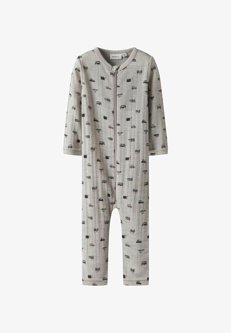 Light gray onesie made of soft fabric, featuring a zipper closure and an all-over print of cars and suitcases in dark colors. Long sleeves.