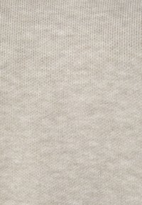 Tessuto tricot beige chiaro con una fine trama a costine, superficie uniforme e sottili variazioni di colore. Aspetto morbido e liscio.