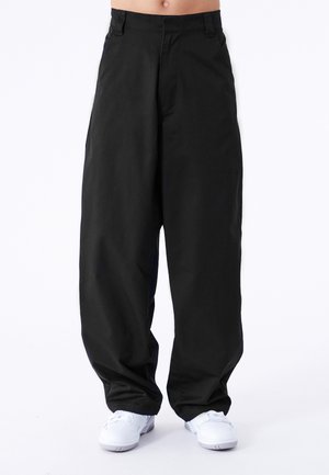 KOBE - Trousers - black