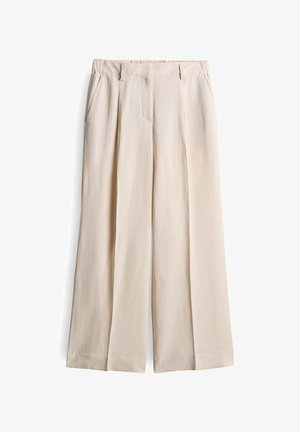 Pantalons larges en tissu beige clair. Comprend des plis à l'avant, deux poches latérales et un ourlet net sans embellissements.