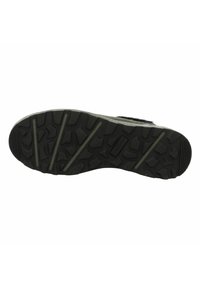 Black rubber sole with deep tread patterns; features a pointed, curved toe and prominent side detailing. Durable for various terrains.