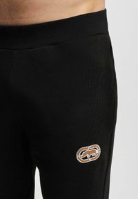 ecko unltd. Tepláky - black