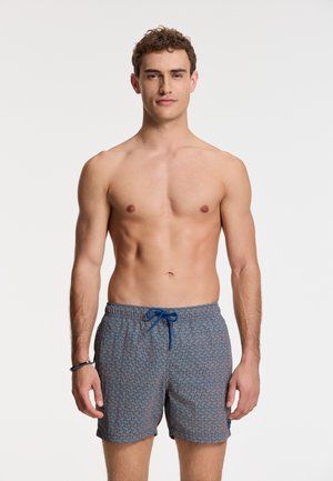 NATE  - Swimming shorts - orange peaches geo maze