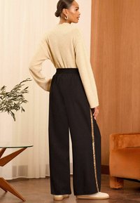 Love & Roses WIDE LEG - Nohavice - black