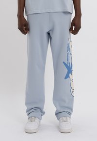 LOW LIGHTS STUDIOS® ASTRO JOGGER - Treniņtērpa apakšdaļas - sky blue