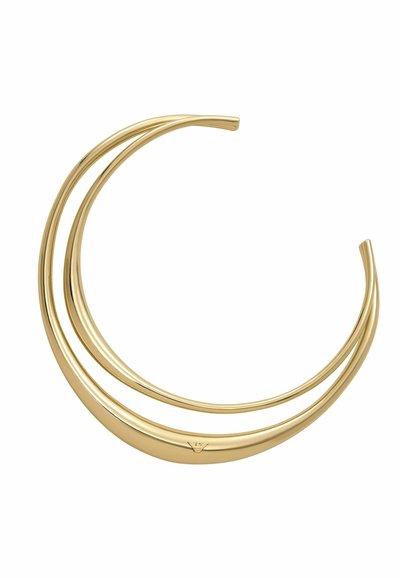 Gold-toned metal cuff bracelet featuring two smooth, curved bands with a polished finish and a subtle logo detail near the clasp.