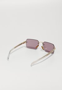 Eyewear by David Beckham Sonnenbrille - gold-coloured/crystal