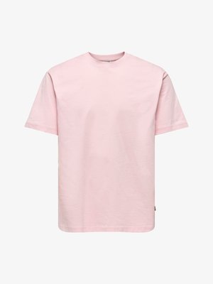 T-shirt en coton rose clair uni à manches courtes, col rond, ourlet droit et coupe décontractée.