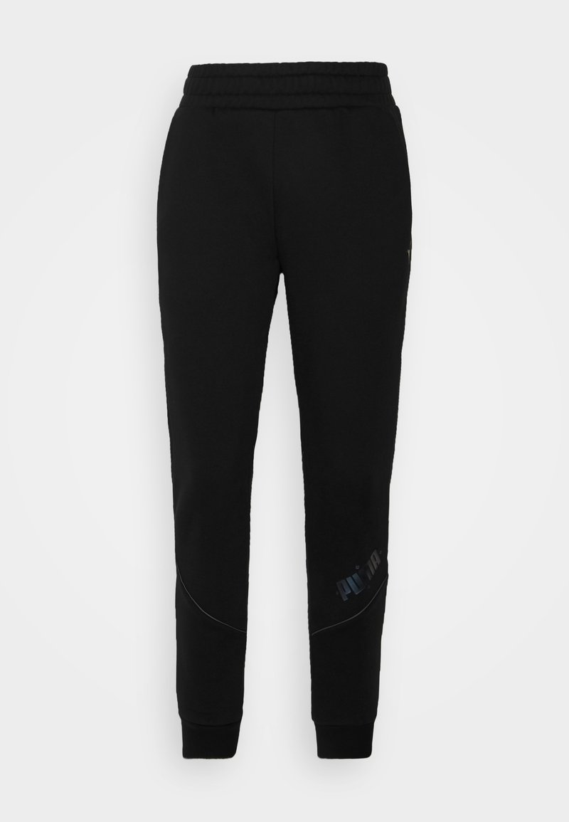 Pantalones de chándal negros hechos de una tela suave, con pierna ajustada, cinturilla elástica y un pequeño logo impreso cerca del dobladillo.
