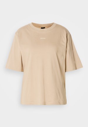 Beige lühikeste varrukatega T-särk, mis on valmistatud pehmest puuvillast ja mille lõige on mugav. Esipoolt kaunistab diskreetne "BOSS" logo.
