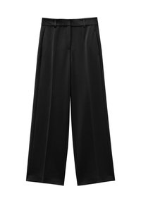 Pantalons larges noirs en tissu lisse. Comprend deux poches avant, un devant plat et des coutures nettes.