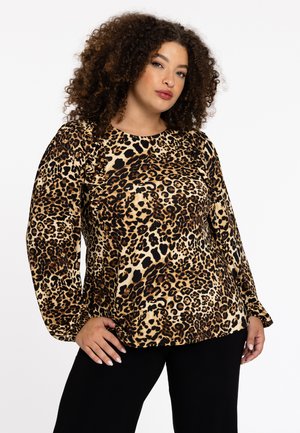 Bluse mit Leopardenmuster, die einen Rundhalsausschnitt, lange Puffärmel und eine lässige Passform bietet. Hergestellt aus weichem, strukturiertem Stoff mit schwarzen Akzenten.