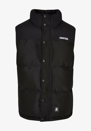 Schwarze gepolsterte Weste mit hohem Kragen, Druckknopfverschluss und Logo auf der Brust. Das Material wirkt glatt mit einer matten Oberfläche.