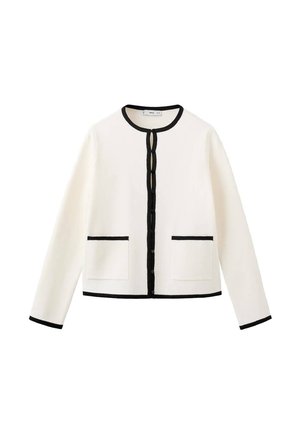 Bela jopa s črnim robom, okrogel izrez in sprednja zapenjanje na gumbe. Ima dva sprednja žepa in dolge rokave. Mehka tekstura tkanine.