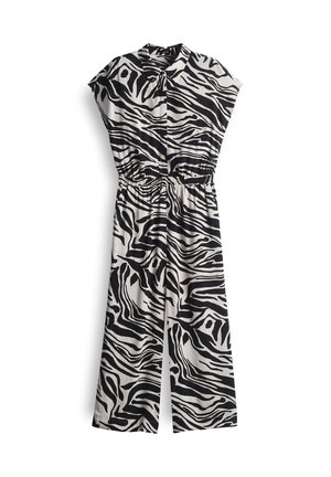 Combinaison à imprimé zèbre noir et blanc avec manches courtes, col, taille élastique et jambes larges. Tissu lisse avec des motifs contrastés.