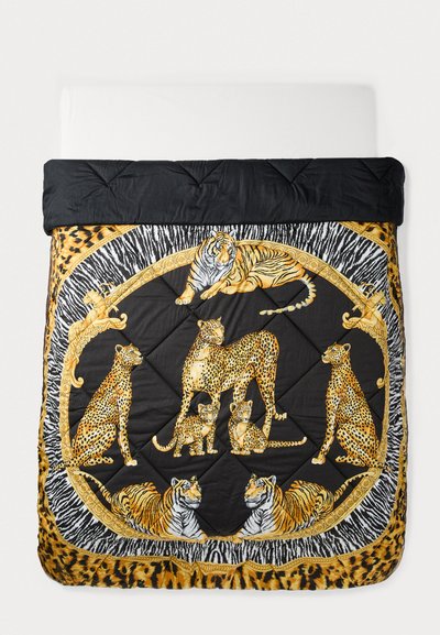 Black quilt featuring a vibrant animal print design with tigers and leopards in gold and yellow tones, set on a contrasting black background.
