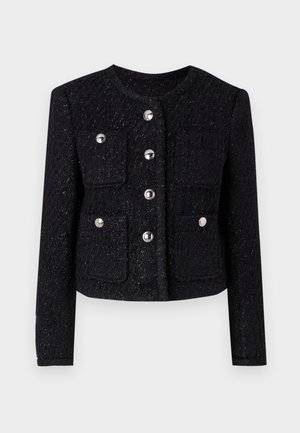 Zwarte tweedjas met een ronde hals, sluiting met knopen aan de voorkant en vier opgestikte zakken. Voorzien van metalen knopen en een gestructureerde afwerking.